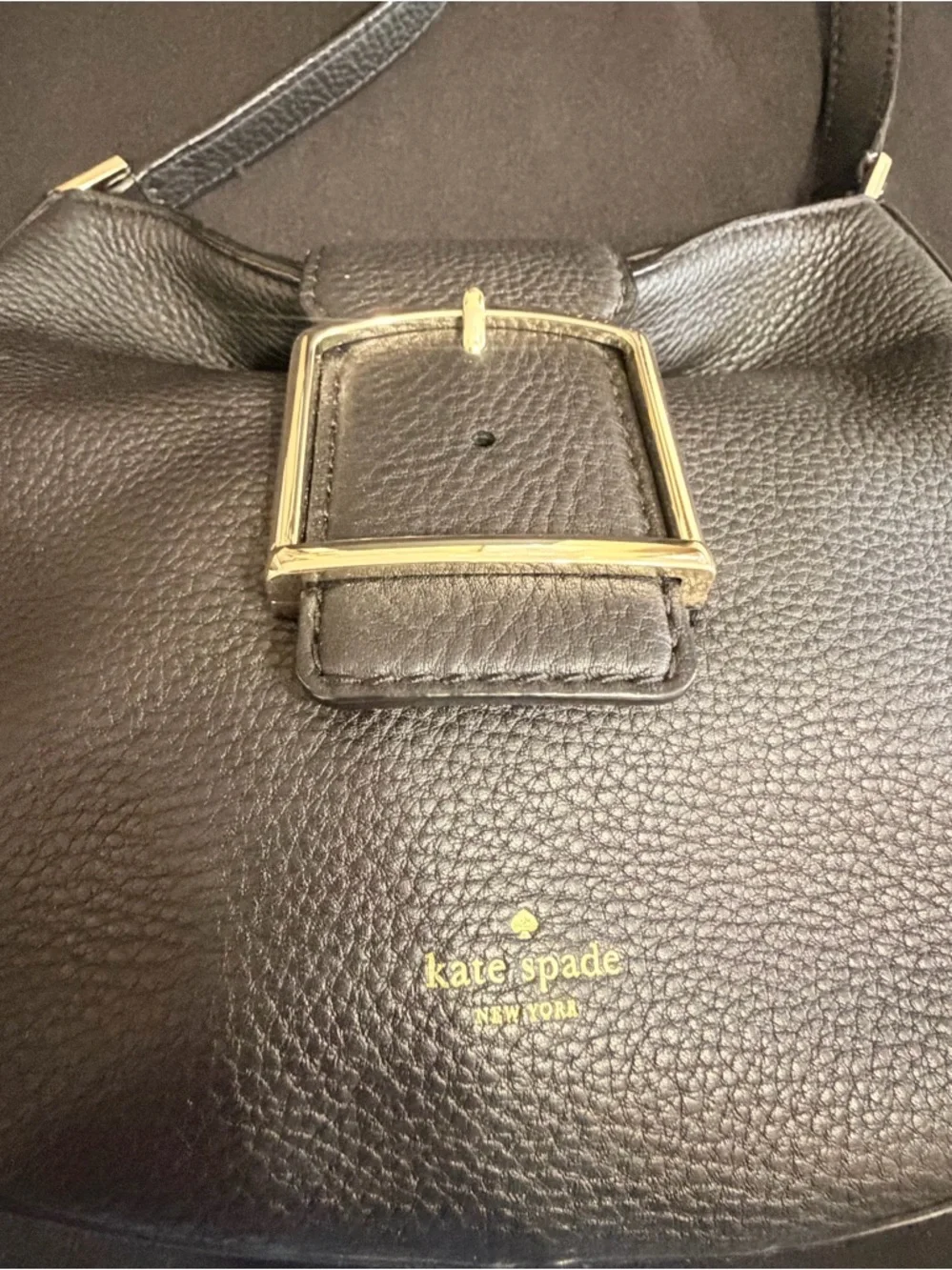 Kate Spade Black Saddle Bag Like New Condition. Very stylish and comfortable.